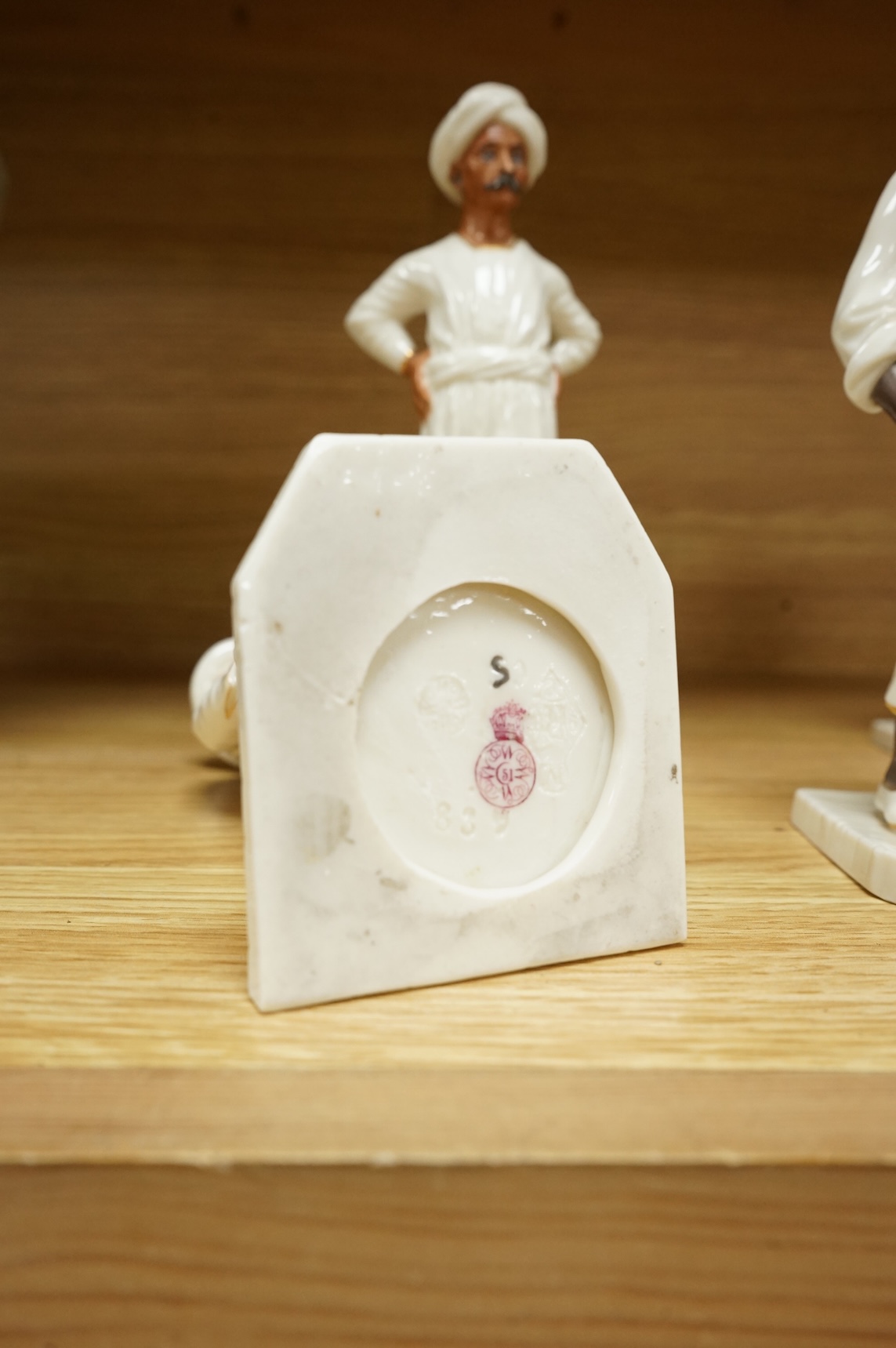 Four Royal Worcester figures from the Countries of the World Series to include Hindu and Chinaman, largest 18cm high